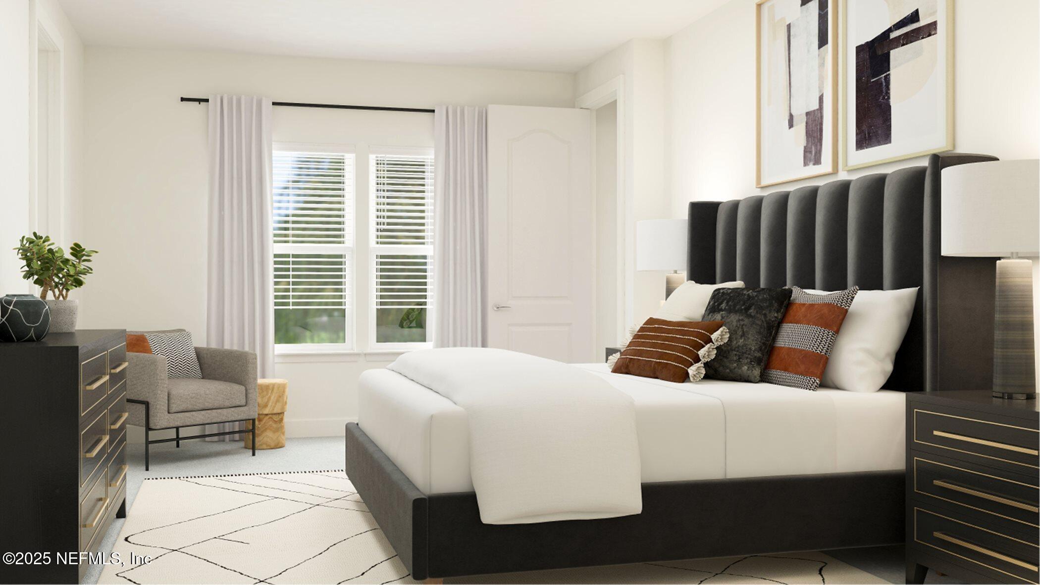 386 Hasler Avenue St. Augustine, FL 32092 - Photo 24 of 32 a bedroom with a bed and a couch