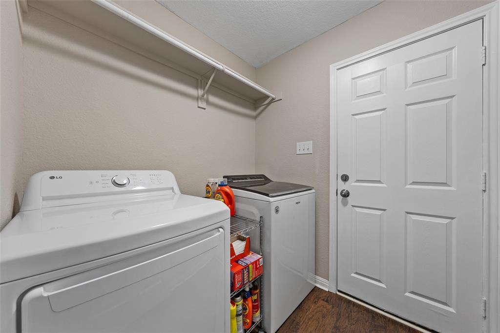 10124 Bunting Drive Waco, TX 76708 - Photo 14 of 18 a utility room with dryer and washer