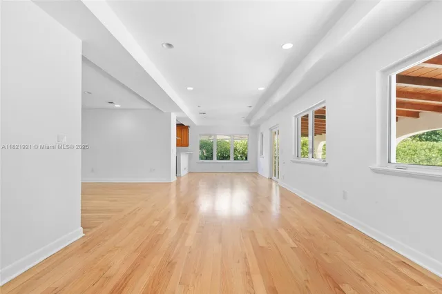 a kitchen that has a sink and a table in it