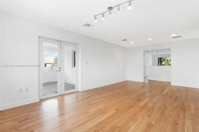 a view of kitchen with wooden floor