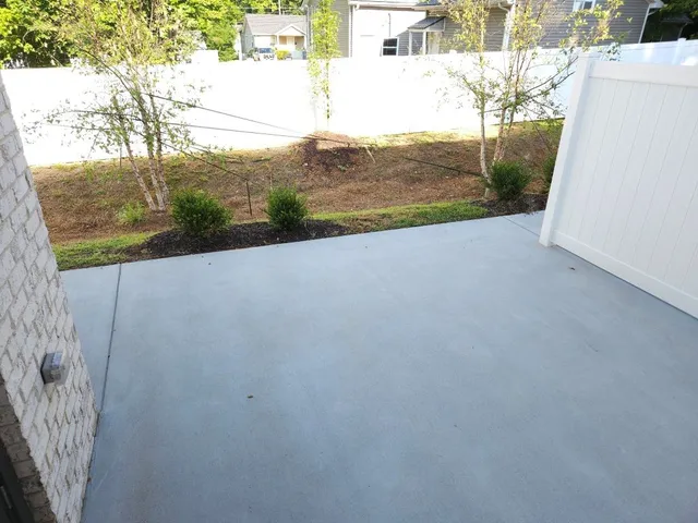 a view of a yard with an outdoor space