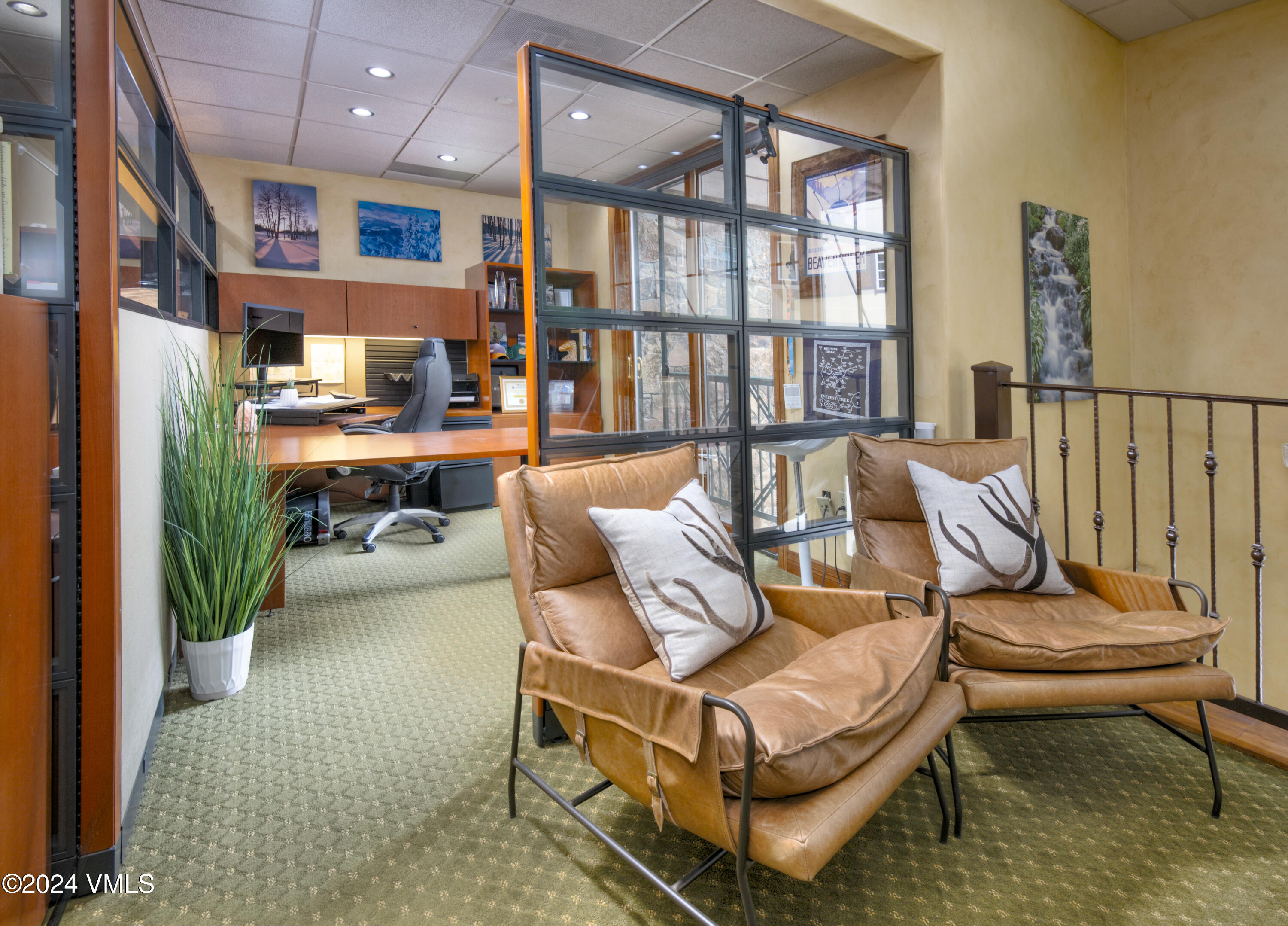 63 Avondale Lane, Unit C001 Beaver Creek, CO 81620 - Photo 12 of 24 a living room with furniture a rug and a large window