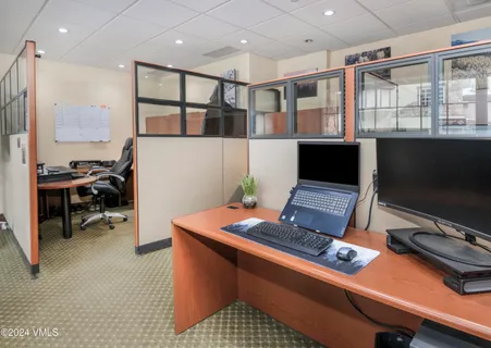 a view of a workspace with a window