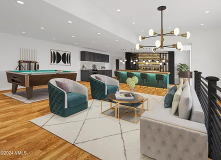 a living room with furniture a rug and a book shelf