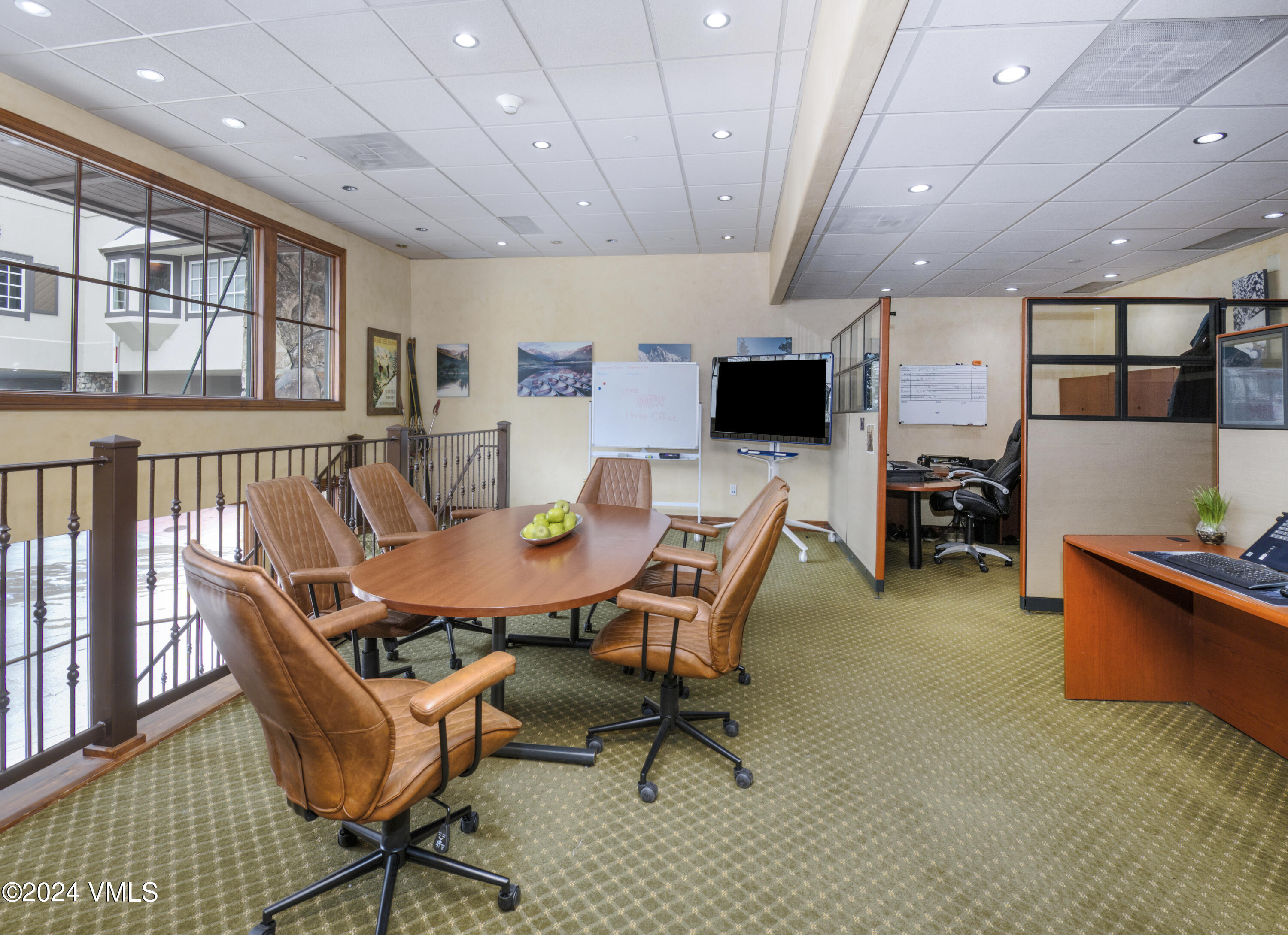 63 Avondale Lane, Unit C001 Beaver Creek, CO 81620 - Photo 9 of 24 a dining room with furniture and a chandelier