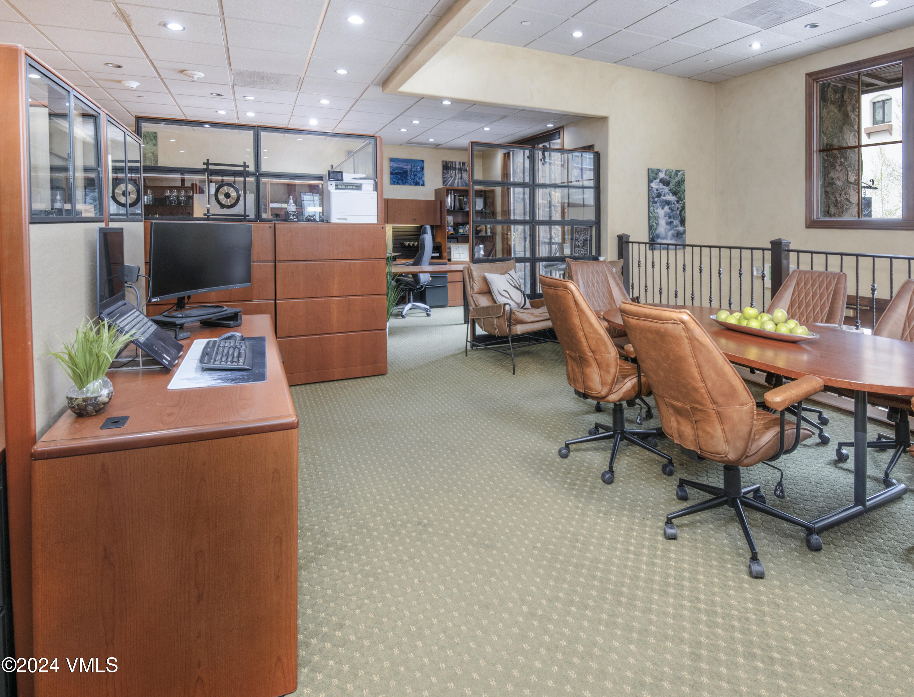 63 Avondale Lane, Unit C001 Beaver Creek, CO 81620 - Photo 10 of 24 a living room with furniture and a flat screen tv