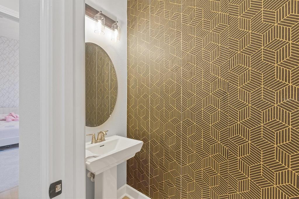 15013 Montello Way Bradenton, FL 34211 - Photo 32 of 100 a bathroom with a sink toilet and mirror