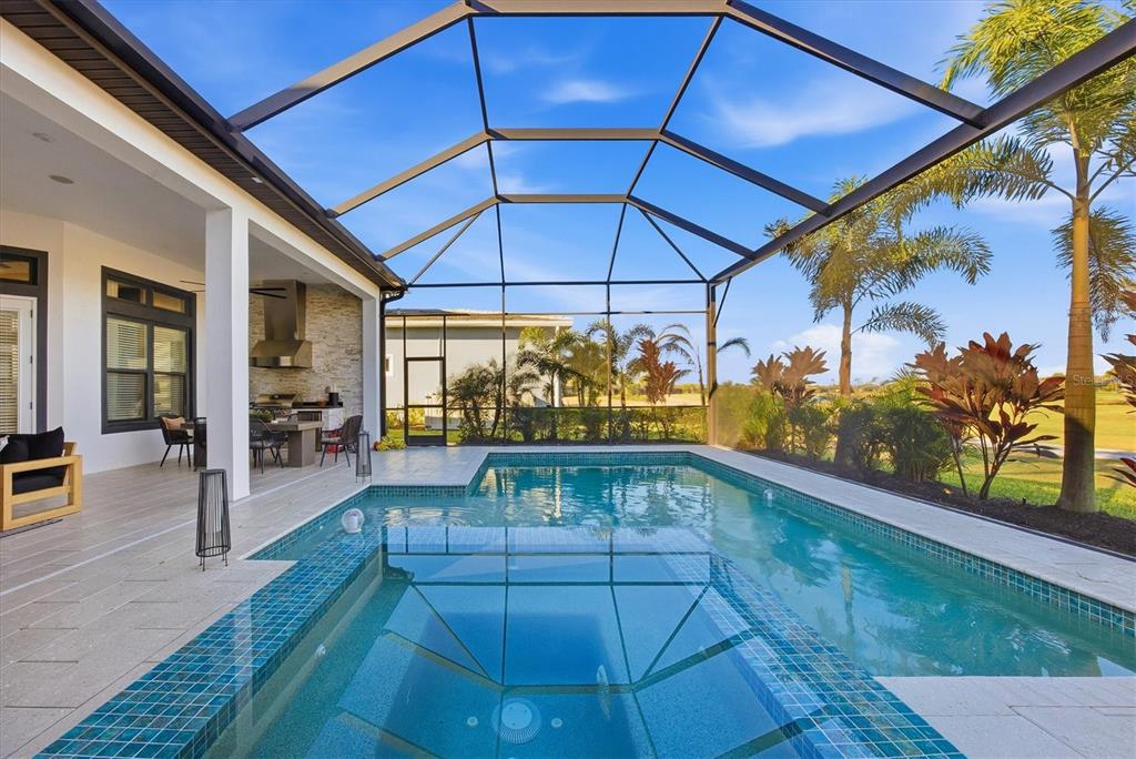 15013 Montello Way Bradenton, FL 34211 - Photo 52 of 100 a view of a backyard with a patio and wooden floor