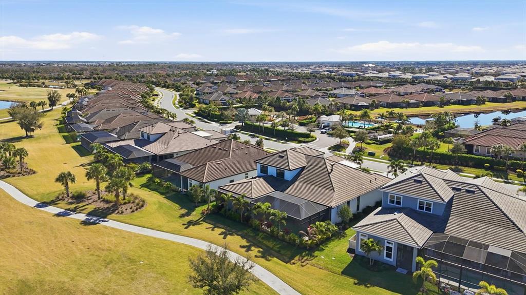 15013 Montello Way Bradenton, FL 34211 - Photo 59 of 100 an aerial view of residential houses with outdoor space