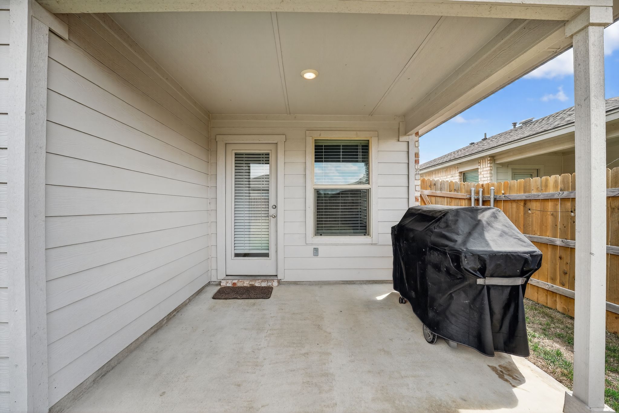 117 Halford Road Georgetown, TX 78633 - Photo 28 of 31 View of exterior entry featuring a patio area