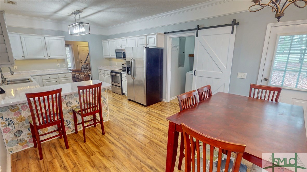 85 Fellwood Drive Rincon, GA 31326 - Photo 11 of 30 View from Nook into kitchen