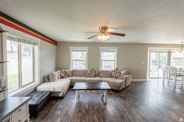 1443 West 250 North Springville, UT 84663 - Photo 13 of 23 Open-concept living area with wood-finish flooring