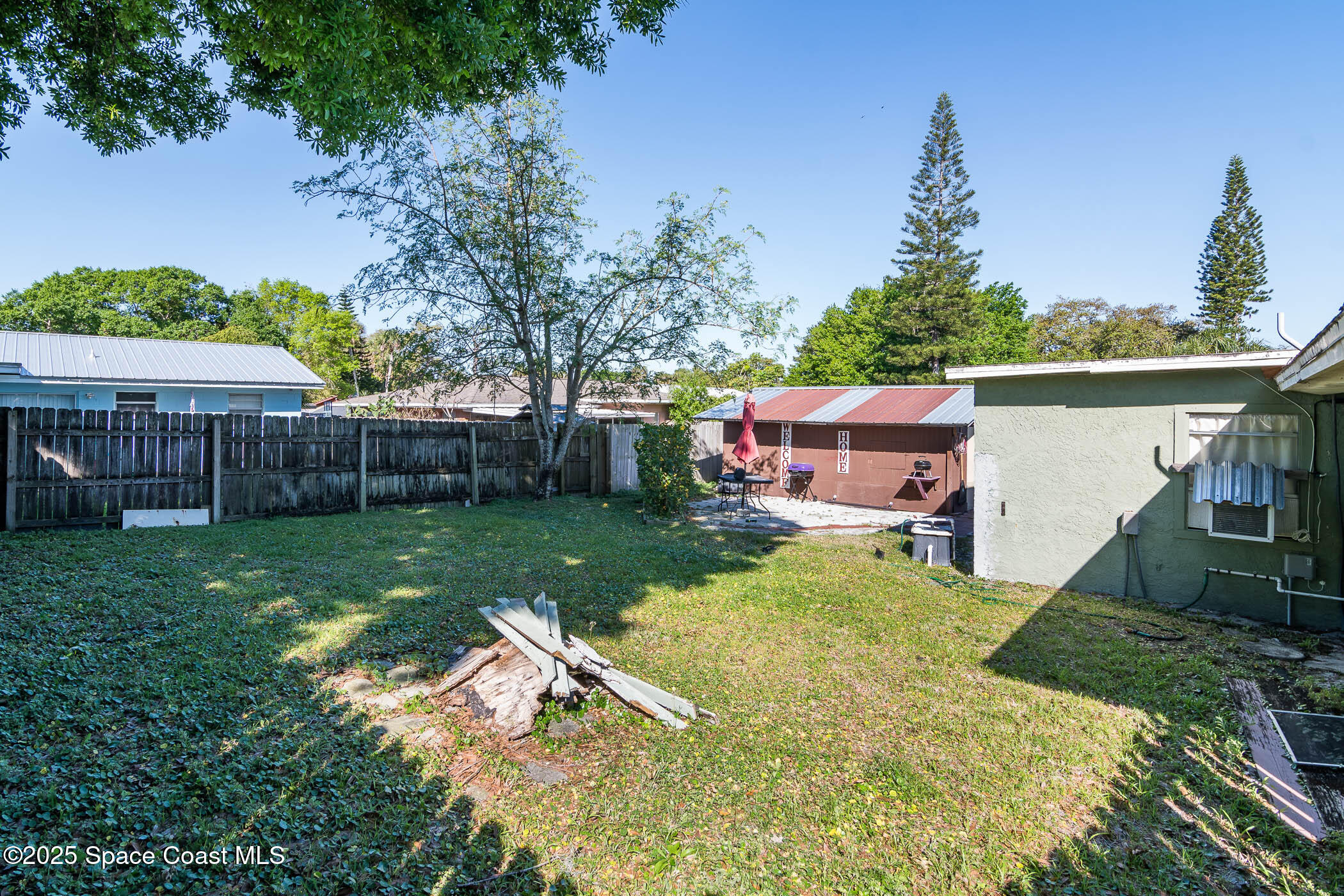 722 Venus Drive Cocoa, FL 32926 - Photo 5 of 17 a view of a house with backyard and sitting area