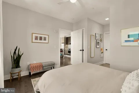 a bedroom with a bed and furniture