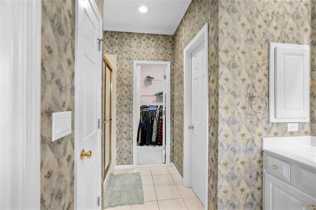 4712 Ivy Ridge Drive Southeast Atlanta, GA 30339 - Photo 36 of 82 a bathroom with a shower and a sink