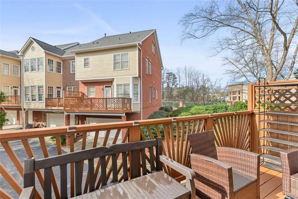 4712 Ivy Ridge Drive Southeast Atlanta, GA 30339 - Photo 54 of 82 a view of a two chairs and table in the balcony