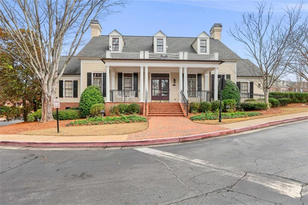 4712 Ivy Ridge Drive Southeast Atlanta, GA 30339 - Photo 60 of 82 front view of a brick house with a yard