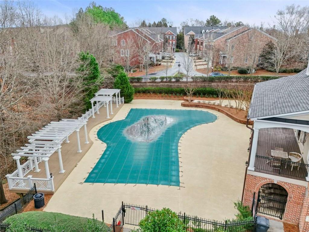 4712 Ivy Ridge Drive Southeast Atlanta, GA 30339 - Photo 66 of 82 a view of a swimming pool with a patio