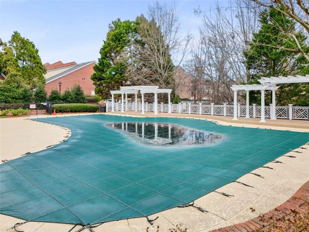 4712 Ivy Ridge Drive Southeast Atlanta, GA 30339 - Photo 69 of 82 front view of a house with a garden