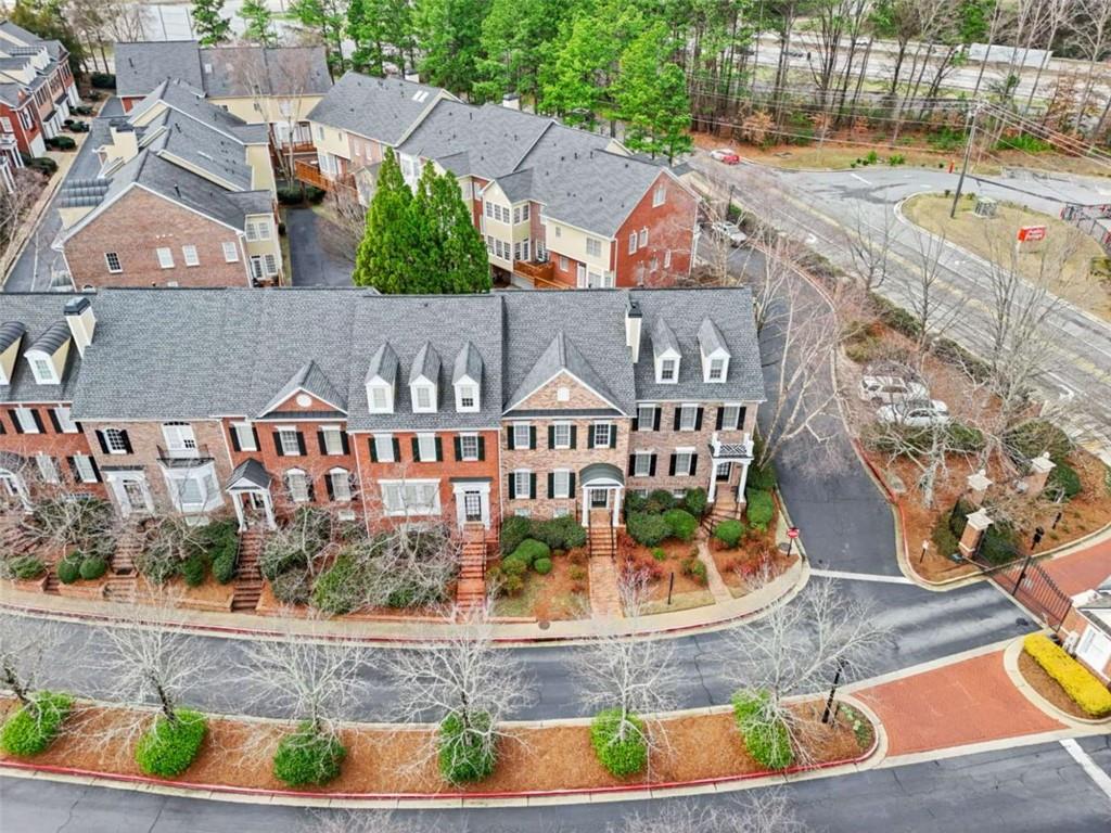 4712 Ivy Ridge Drive Southeast Atlanta, GA 30339 - Photo 76 of 82 an aerial view of a house with a swimming pool