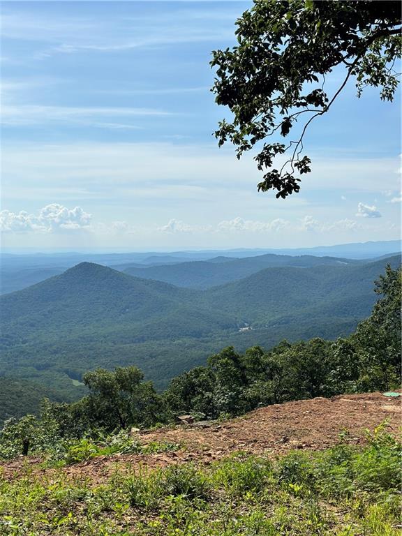 5472 Monument Road Big Canoe, GA 30143 - Photo 4 of 8 a view of a lake with a mountain