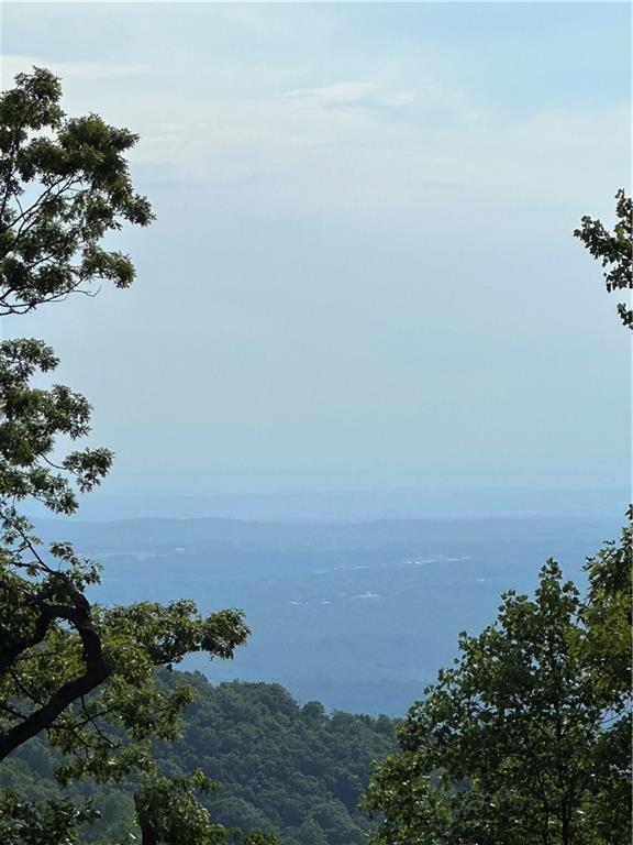 5472 Monument Road Big Canoe, GA 30143 - Photo 7 of 8 an aerial view of a city and mountain view in back