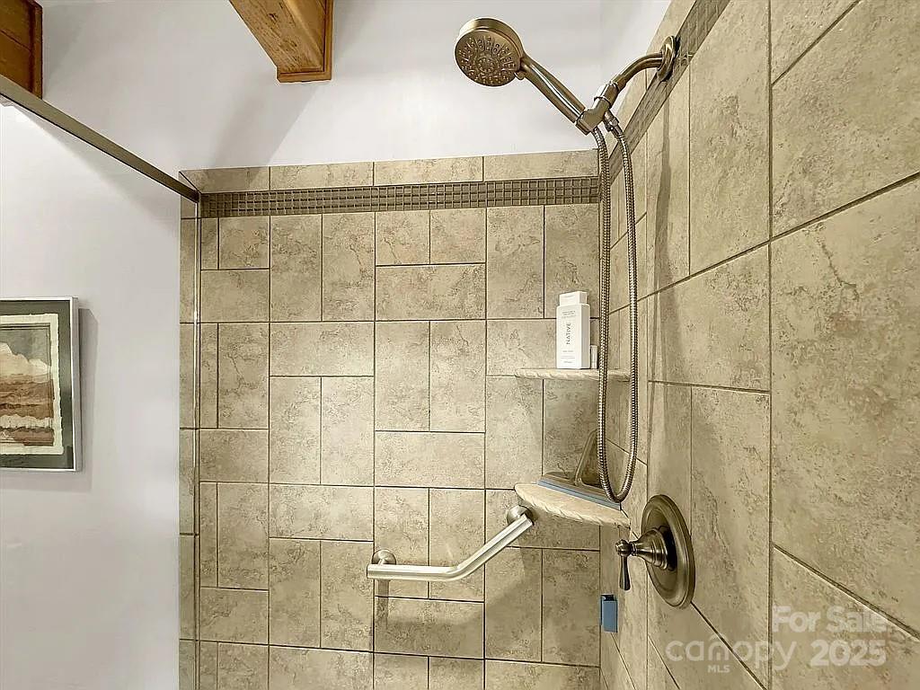 113 Mountain Cove Road Waynesville, NC 28786 - Photo 12 of 48 a bathroom with a shower
