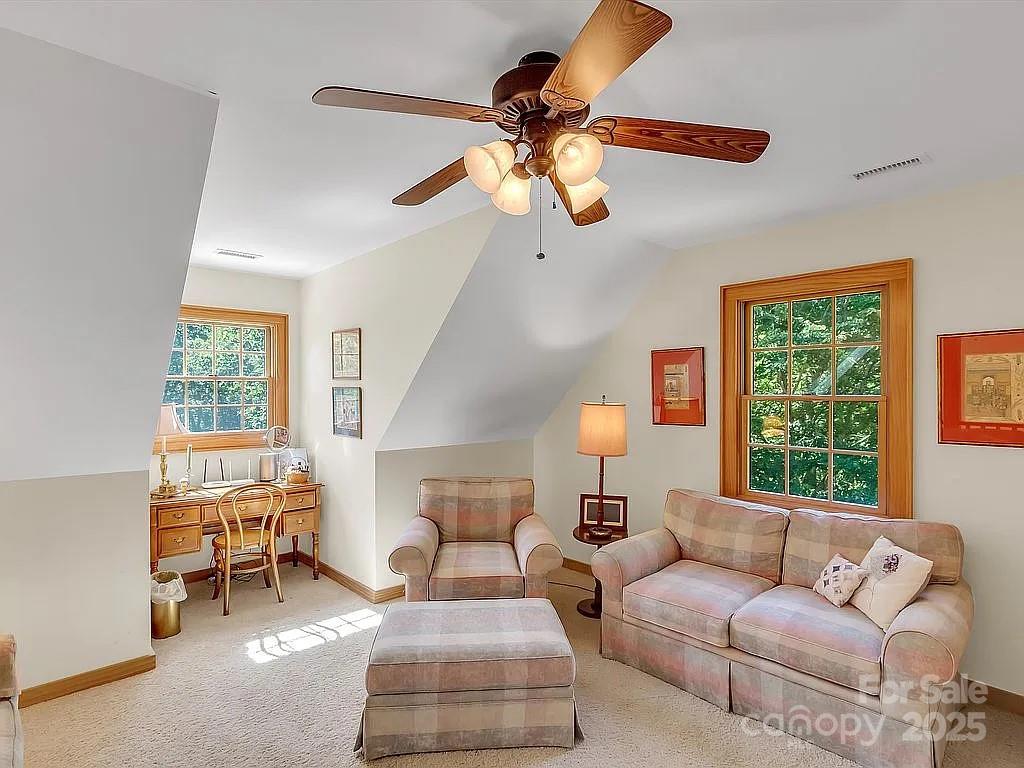 113 Mountain Cove Road Waynesville, NC 28786 - Photo 15 of 48 a living room with furniture and a large window