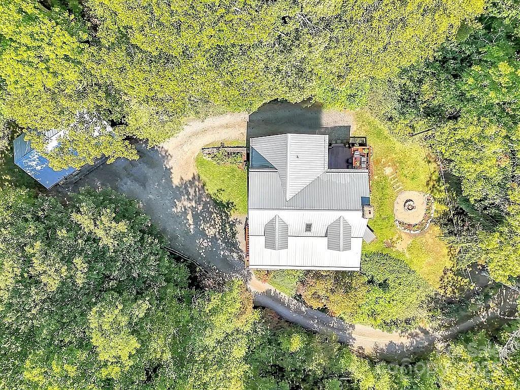 113 Mountain Cove Road Waynesville, NC 28786 - Photo 33 of 48 an aerial view of residential house with outdoor space and swimming pool
