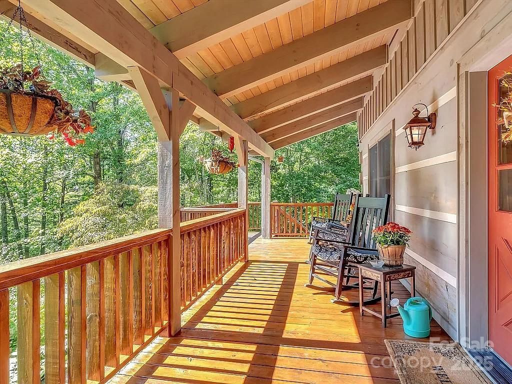 113 Mountain Cove Road Waynesville, NC 28786 - Photo 47 of 48 a view of a two chairs in the balcony