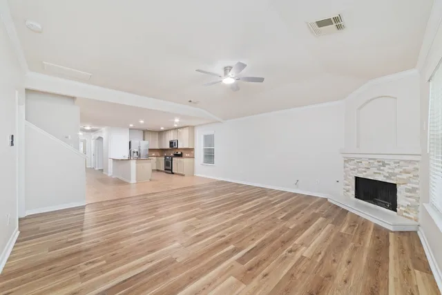 a backyard of a house with lots of green space