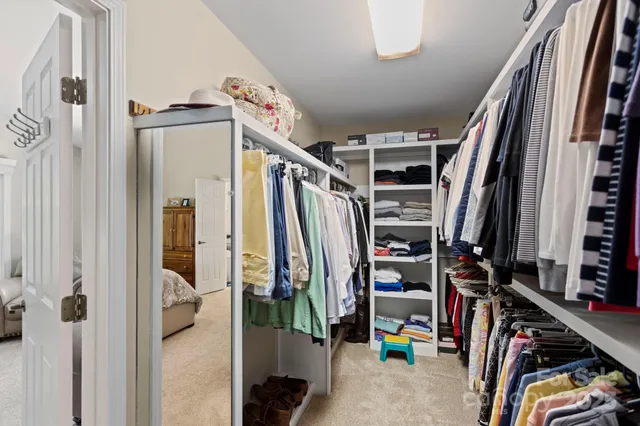 a view of a storage and utility room with stairs