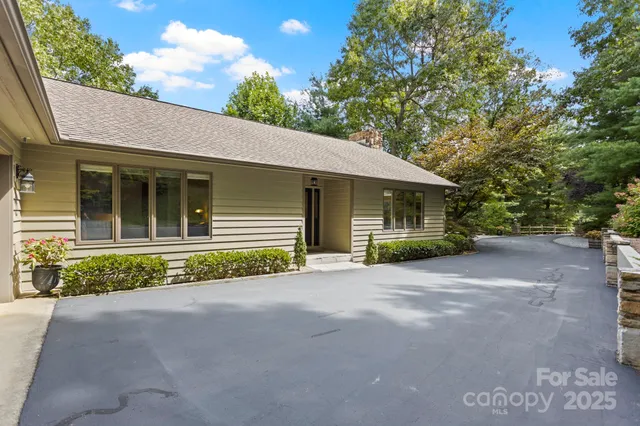 a view of a house with a garden