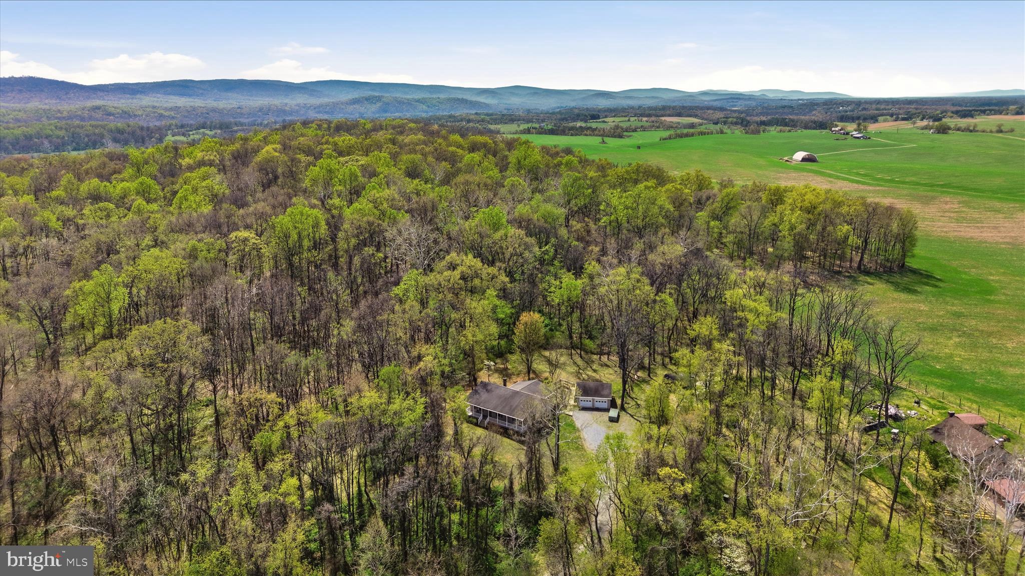 622 Co Rte 25/7 Charles Town, WV 25414 - Photo 2 of 54 Situated on 18.2 wooded acres