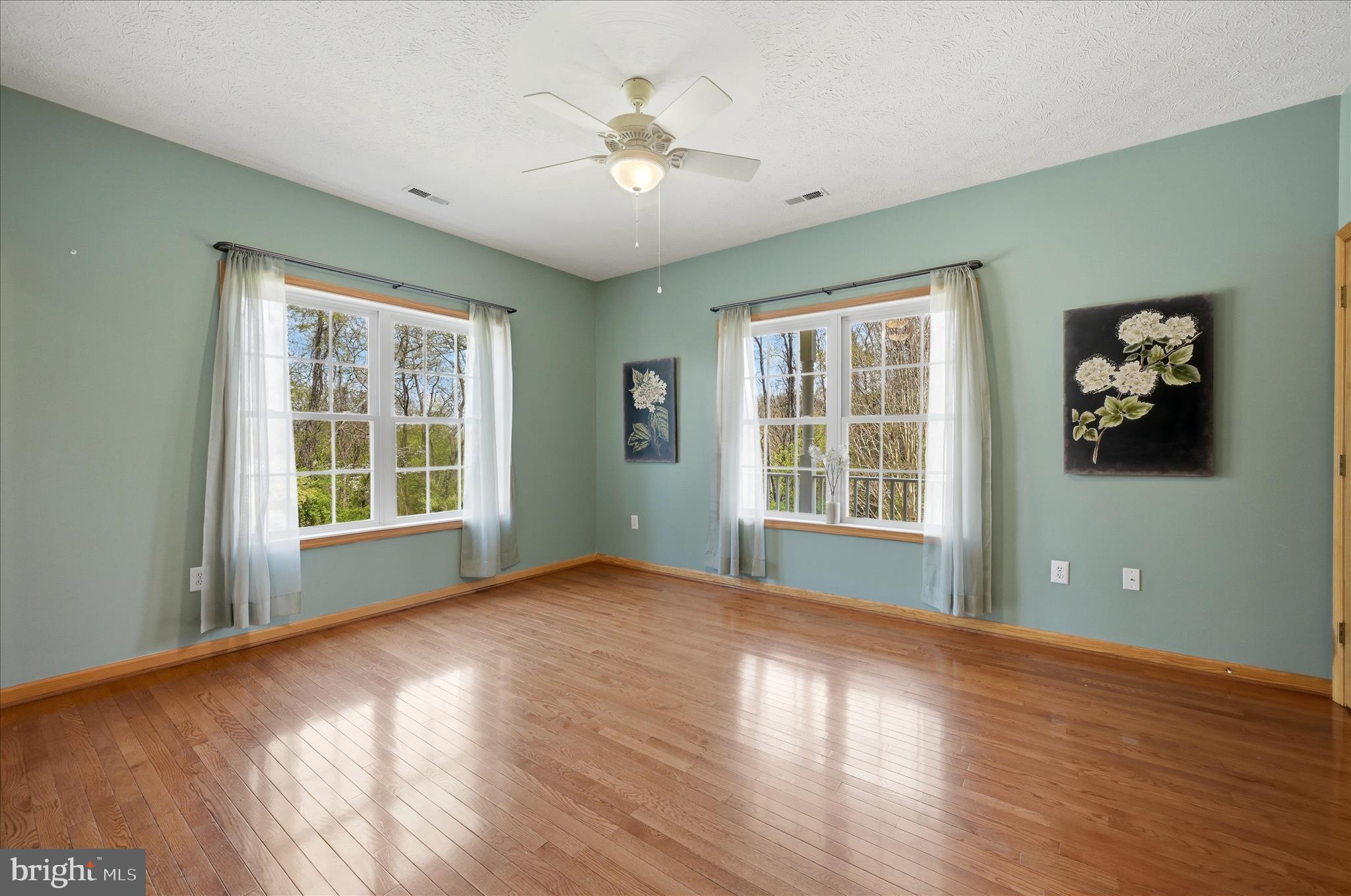 622 Co Rte 25/7 Charles Town, WV 25414 - Photo 26 of 54 a view of an empty room with wooden floor and a window