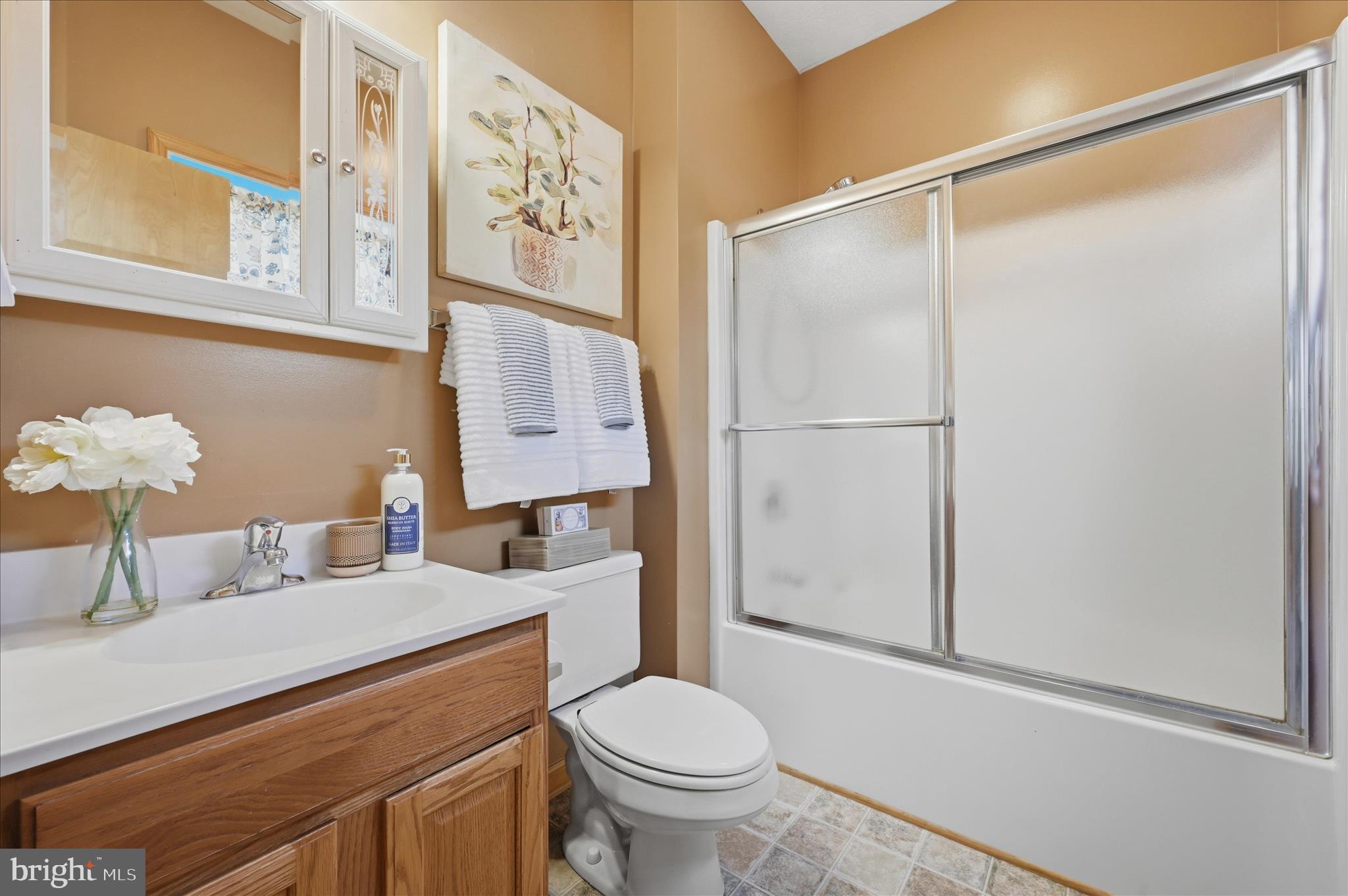 622 Co Rte 25/7 Charles Town, WV 25414 - Photo 28 of 54 a bathroom with a sink toilet and vanity