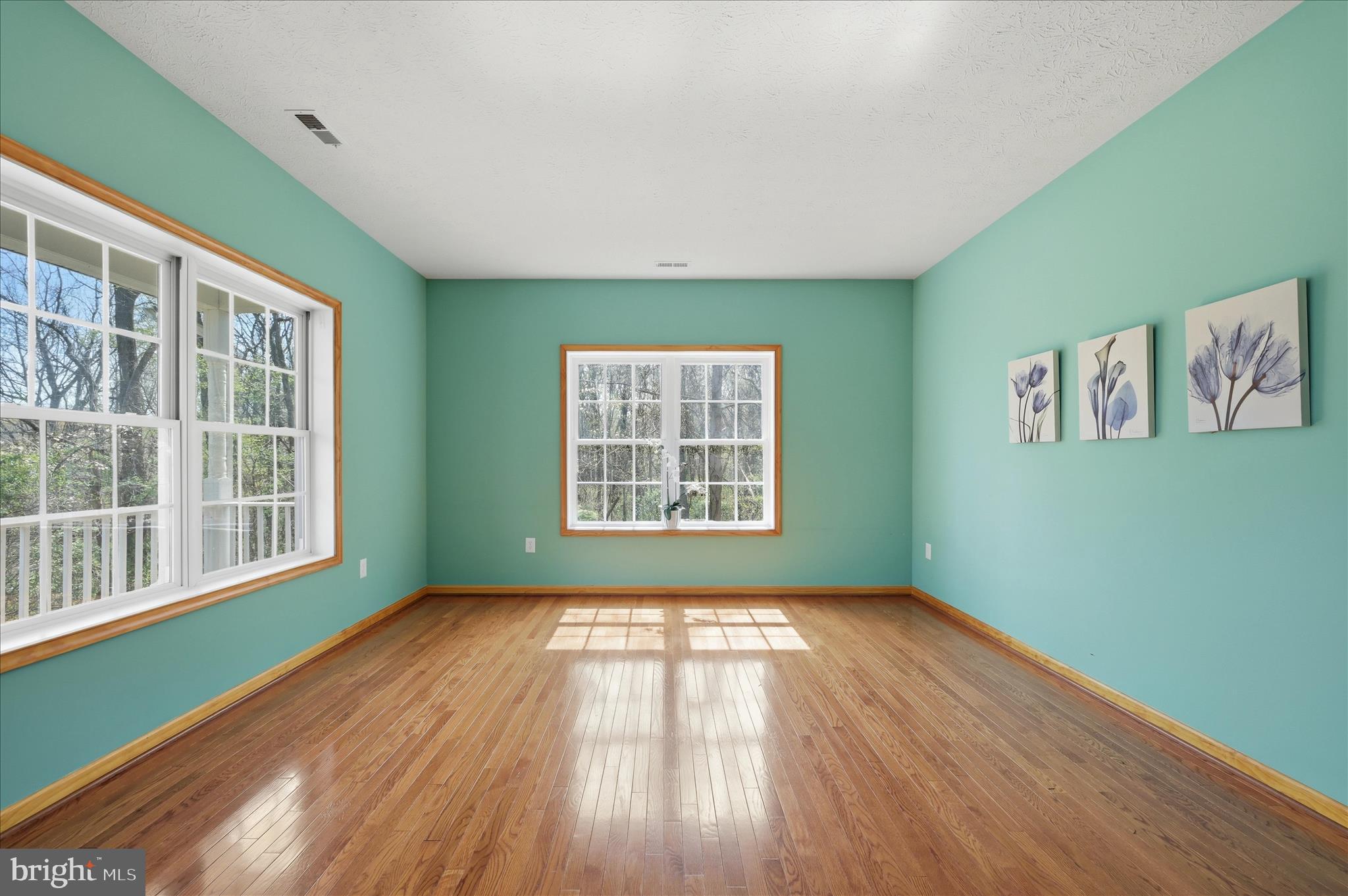 622 Co Rte 25/7 Charles Town, WV 25414 - Photo 32 of 54 a view of empty room with wooden floor and fan