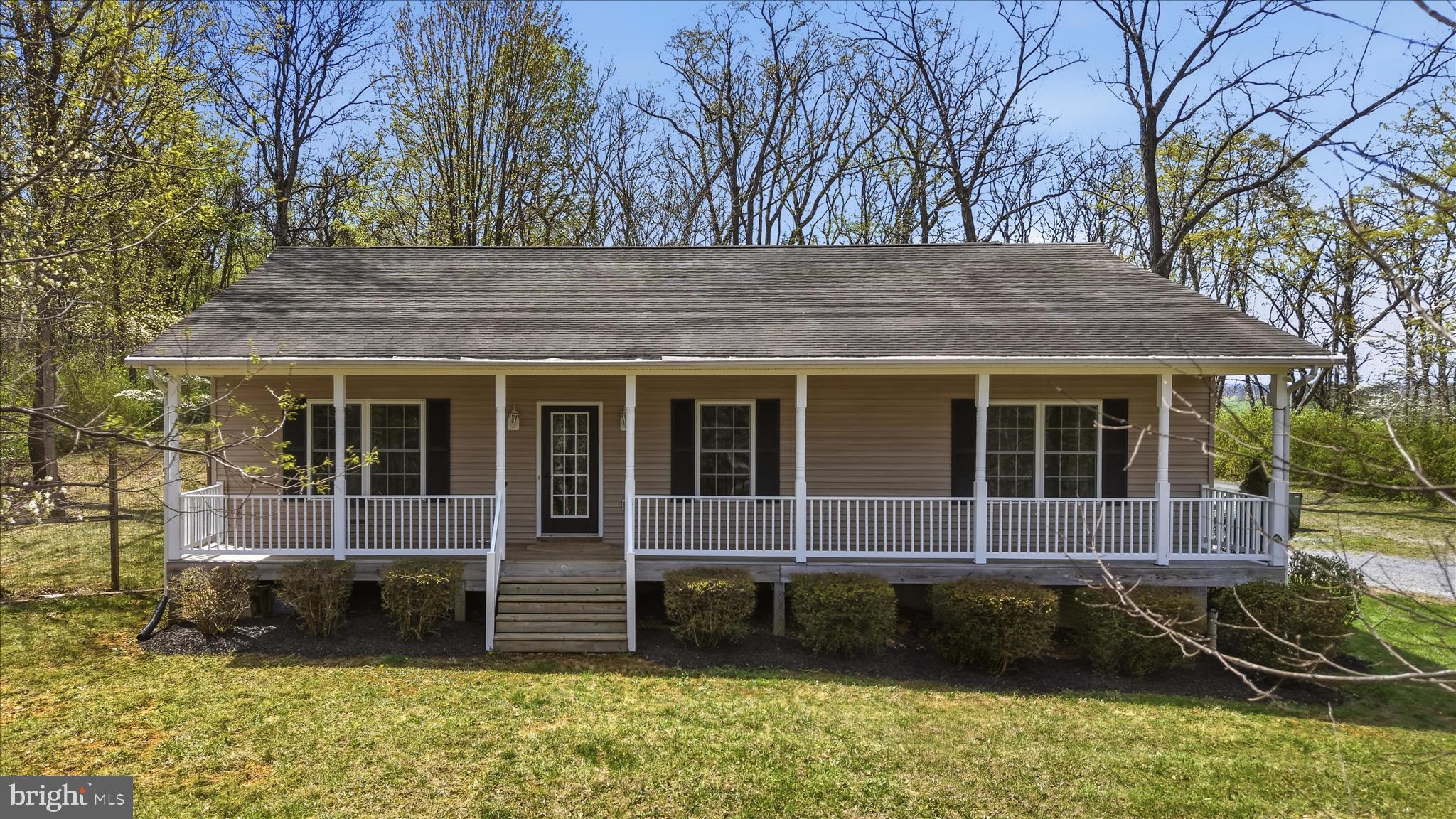622 Co Rte 25/7 Charles Town, WV 25414 - Photo 35 of 54 a house view with a garden space