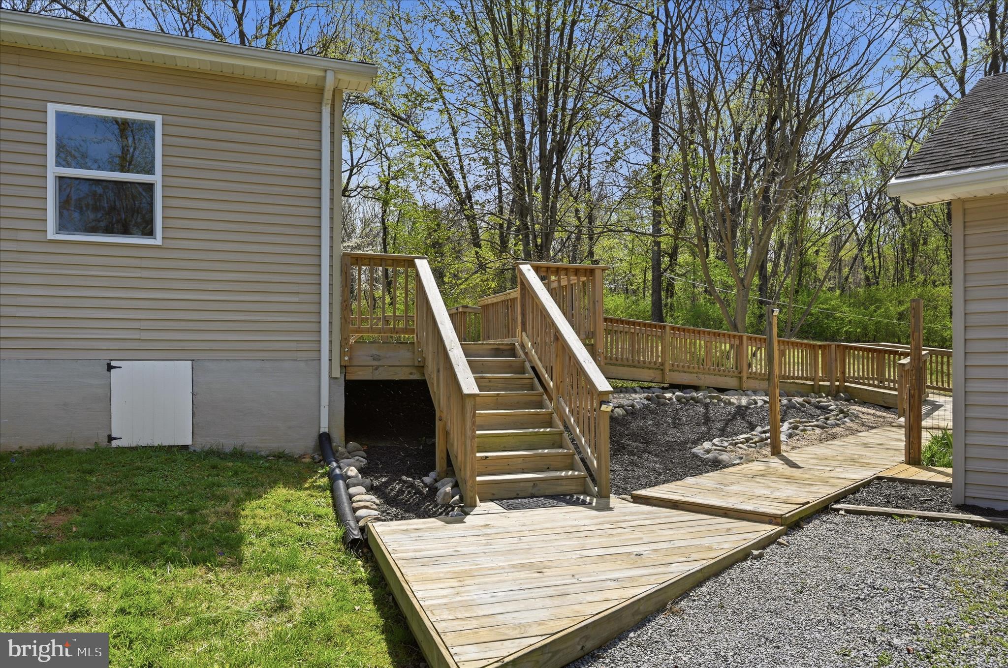 622 Co Rte 25/7 Charles Town, WV 25414 - Photo 37 of 54 a view of a roof deck with a chair and a potted plant