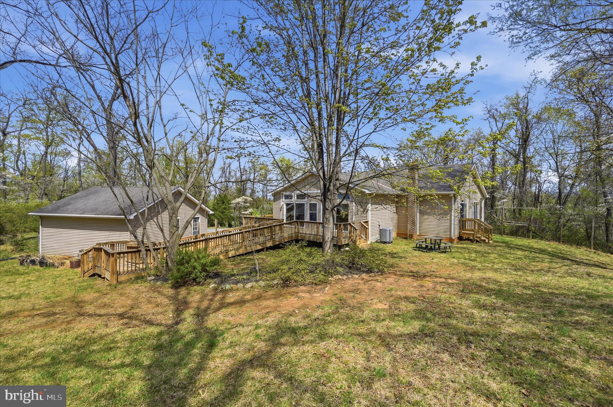 622 Co Rte 25/7 Charles Town, WV 25414 - Photo 40 of 54 a view of a yard in front of a house with a large tree