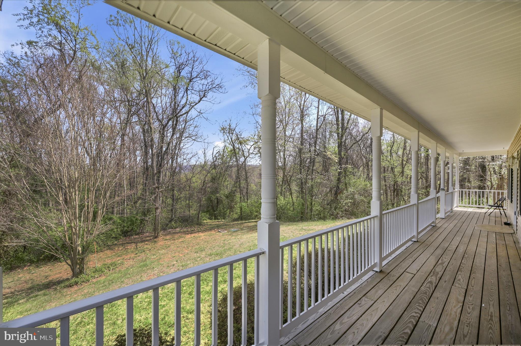 622 Co Rte 25/7 Charles Town, WV 25414 - Photo 5 of 54 a view of a balcony with wooden floor