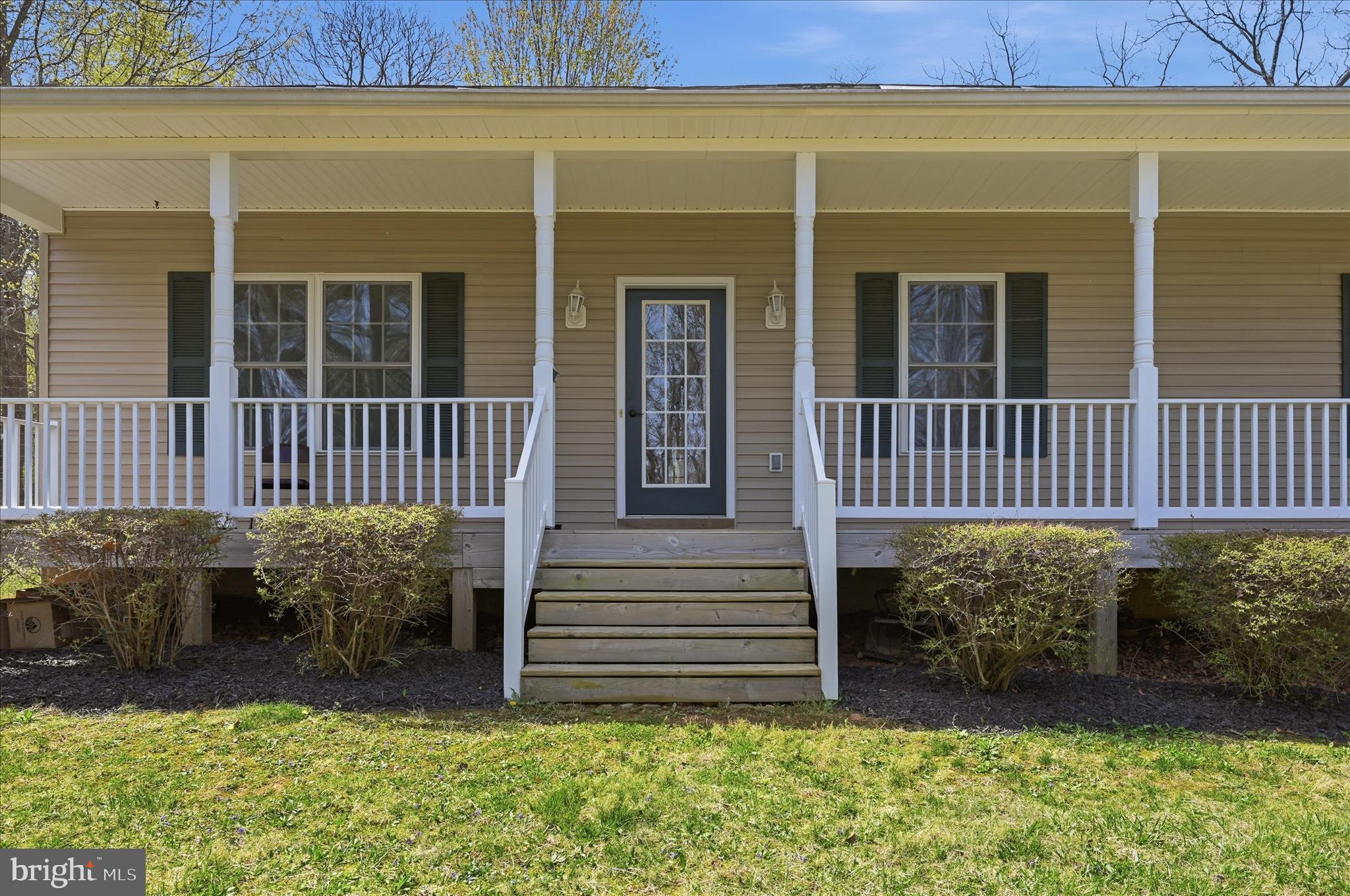 622 Co Rte 25/7 Charles Town, WV 25414 - Photo 6 of 54 a view of a house with a small yard and wooden fence