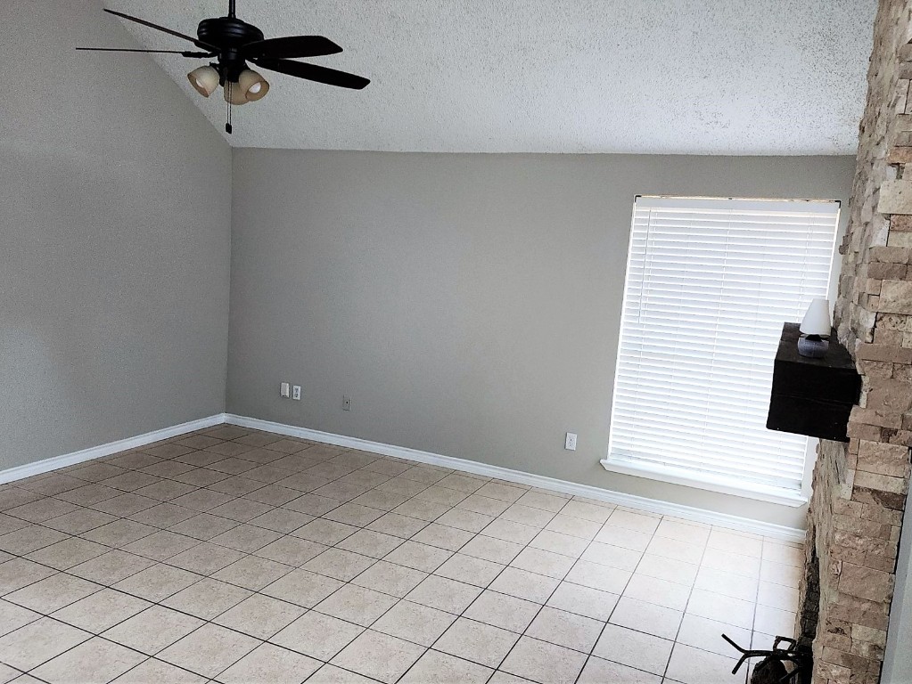 2402 Chestnut Mills Road Houston, TX 77067 - Photo 6 of 11 an empty room with windows