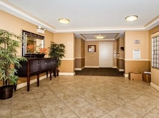 a view of a livingroom with furniture and furniture