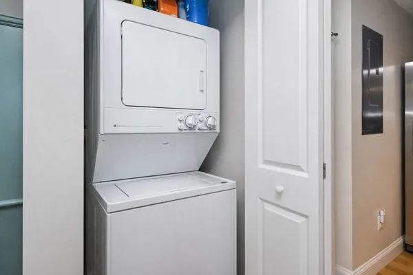 a utility room with dryer and washer