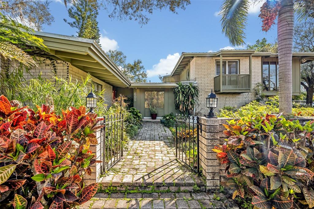 605 Sweetbriar Road Orlando, FL 32806 - Photo 3 of 50 GATED ENTRY TO FRONT OF HOME