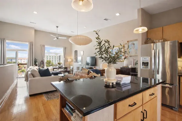 a kitchen with counter space cabinets and appliances