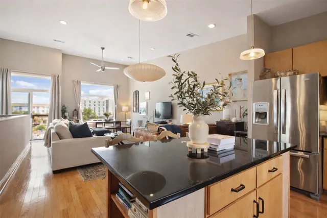 a kitchen with counter space cabinets and appliances