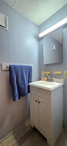 a view of a lake with houses in the back