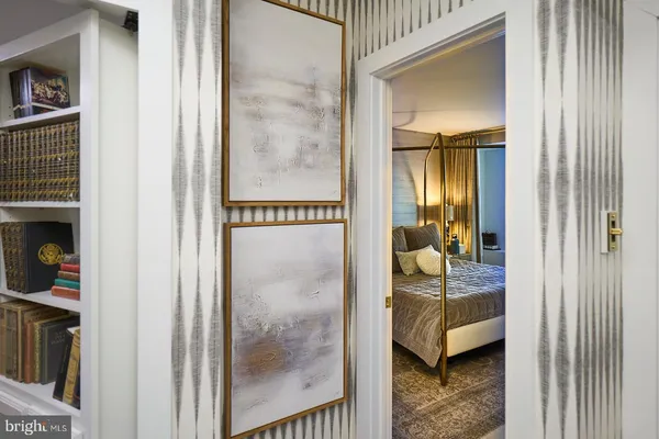 a en suite bathroom with a sink and a mirror